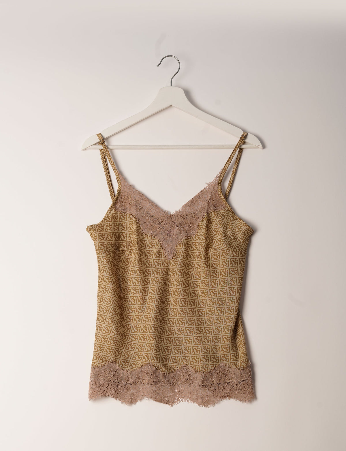 Sleep in eco-friendly luxury with our PJ Set Short. Made for the conscious consumer, these pajamas contribute to zero waste and sustainable practices. The cami top, adorned with delicate eyelash lace and cut on the bias, pairs seamlessly with the comfy shorts featuring an elasticated waist and drawstring tie.