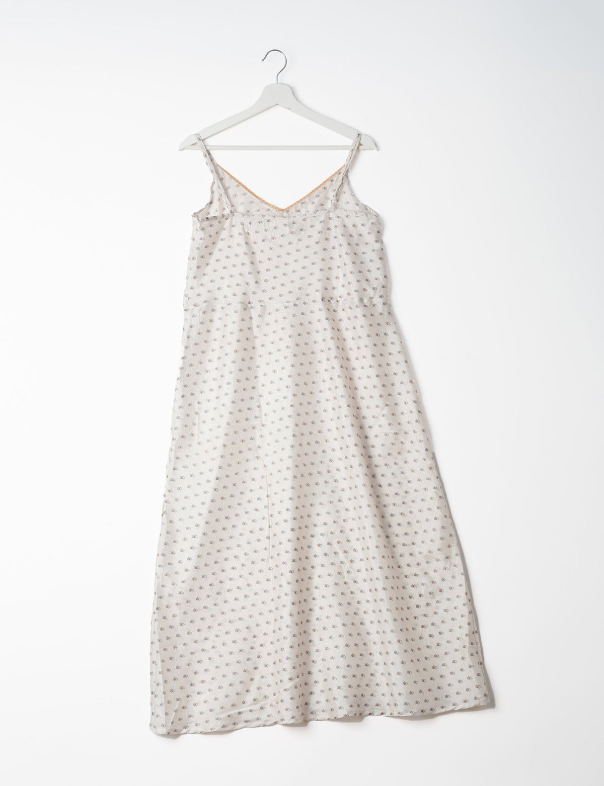 Spaghetti strap dress made from sustainable materials, embodying ethical fashion principles. Ideal for eco-friendly travelers seeking laid-back style.