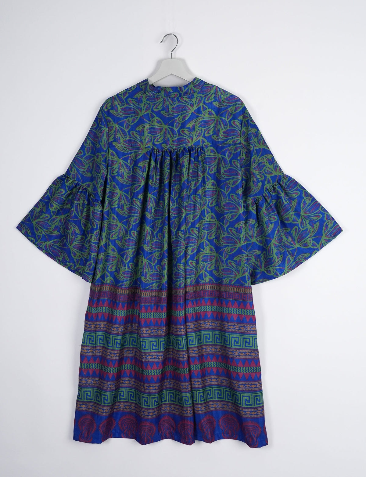 Discover ethical elegance with our Bell Sleeve Coat, handcrafted by Indian artisans from recycled materials. This sustainable fashion piece is a statement in eco-friendly clothing, combining style and consciousness effortlessly.