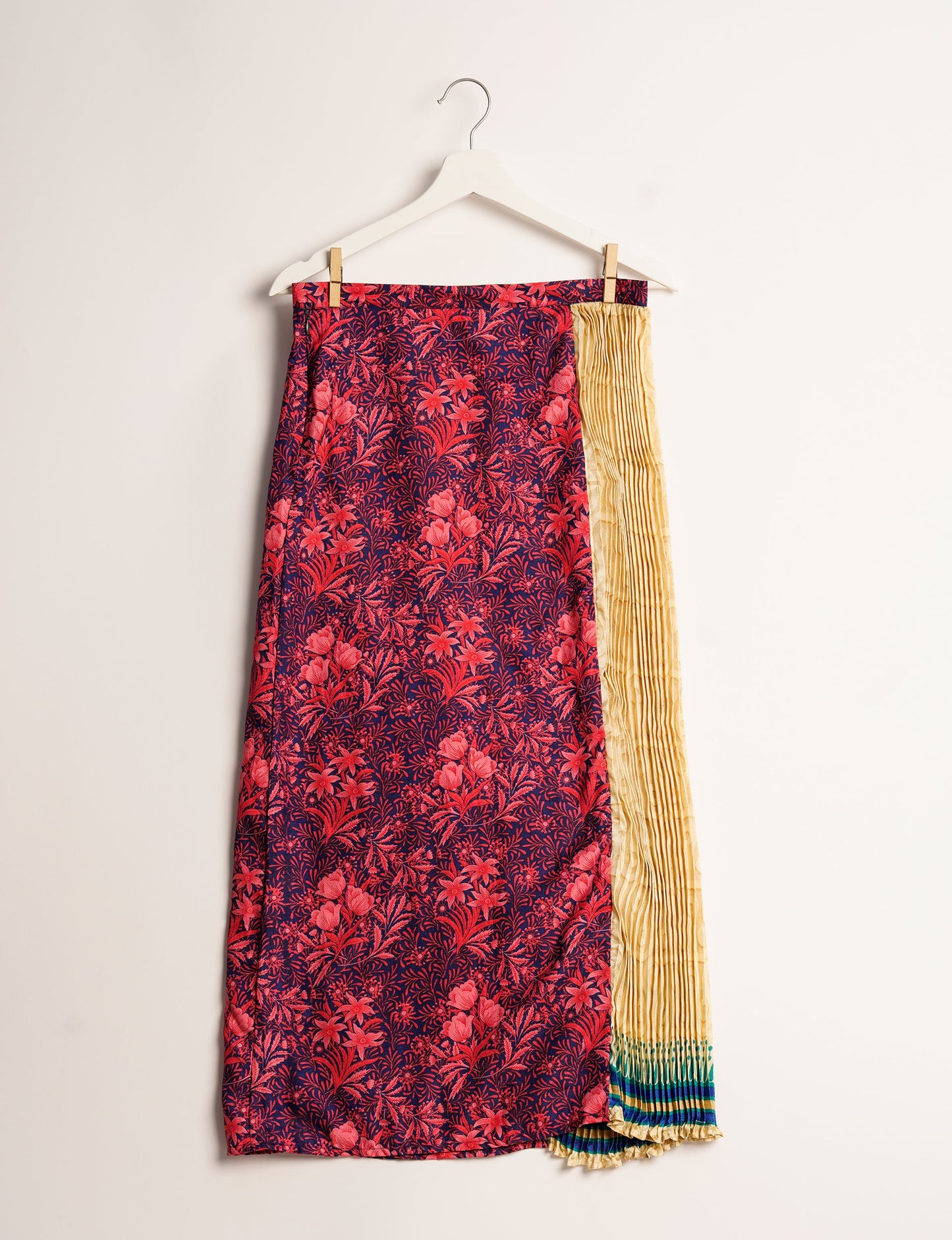 Elevate your wardrobe with the Semi Pleated A-Line Skirt, a sustainable fashion statement. Unique prints, a mix of fabrics, and intricate knife pleats create an individualized, upscale day-to-night look. Crafted with ethical and green fashion values, this skirt represents the essence of eco-friendly style.