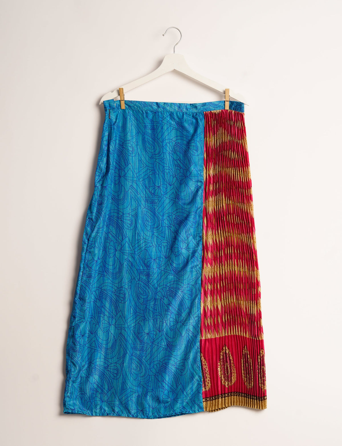 Elevate your wardrobe with the Semi Pleated A-Line Skirt, a sustainable fashion statement. Unique prints, a mix of fabrics, and intricate knife pleats create an individualized, upscale day-to-night look. Crafted with ethical and green fashion values, this skirt represents the essence of eco-friendly style.