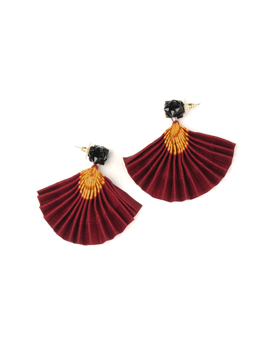 Elevate your style sustainably with our PLEATED EARRINGS – a harmonious blend of ethical fashion and eco-conscious design. Fashioned using innovative heat setting techniques on pre-loved Indian saris, these accessories showcase a commitment to slow fashion and upcycled fashion. Enjoy planet-friendly charm with hypoallergy tested metal hooks, nickel, and lead-free for a skin-friendly touch.
