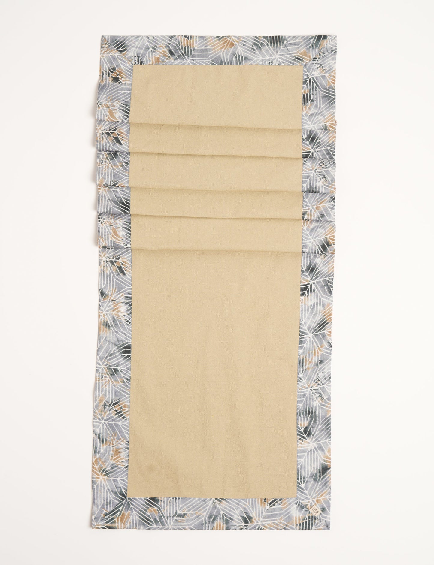 Crafted with care, our 160x40 cm reversible table runner is a blend of 100% cotton canvas and upcycled sari fabric. Ethical, green, and designed for sustainability, this piece adds a unique touch to your dining setup, sparking conversations about eco-friendly living.