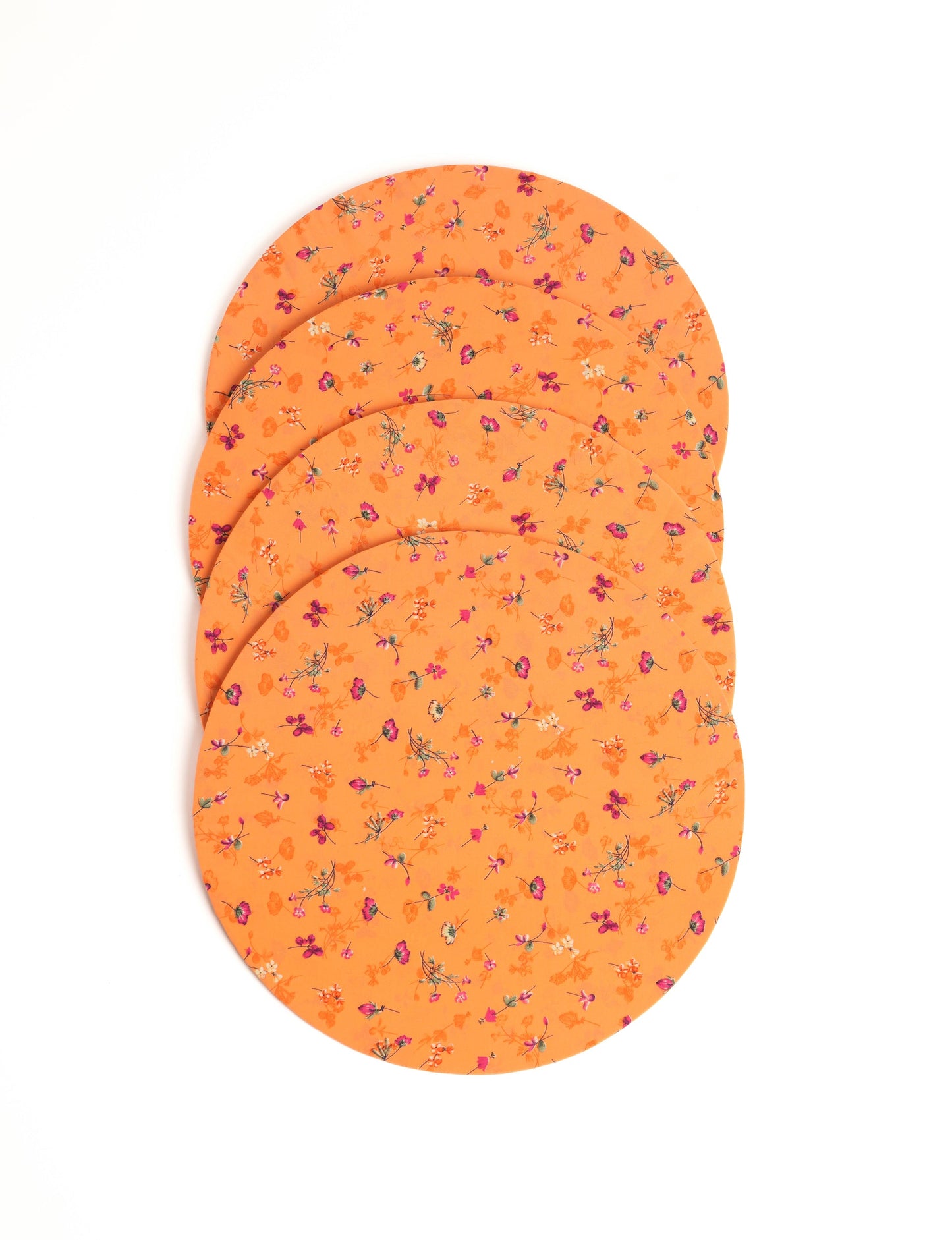 Upgrade your table settings with our Round Placemat Set of 4. These circular placemats, made from sustainable 3 mm thick MDF, feature covers crafted from round sari sleeves. Easily washable and elasticated, these placemats offer a stylish and eco-friendly solution for both table place settings and serving dishes. Make a sustainable statement with every meal.