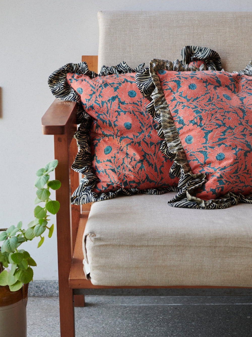 Upcycled sari cushion cover with piping edge, 40x40 cm, eco-friendly and sustainable home decor.