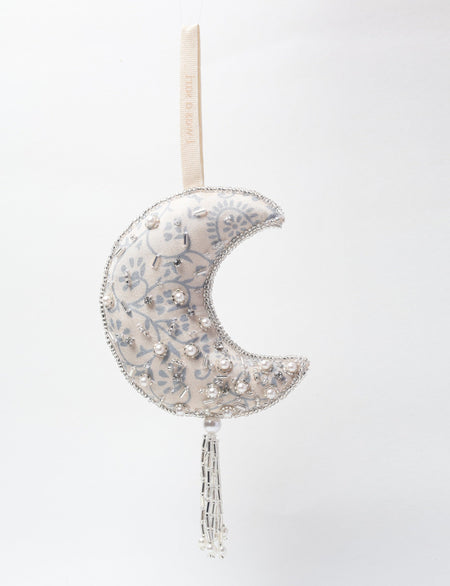 Silver colored crescent moon ornament