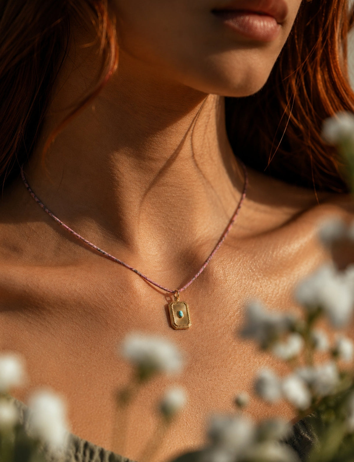 Cord necklace with charm