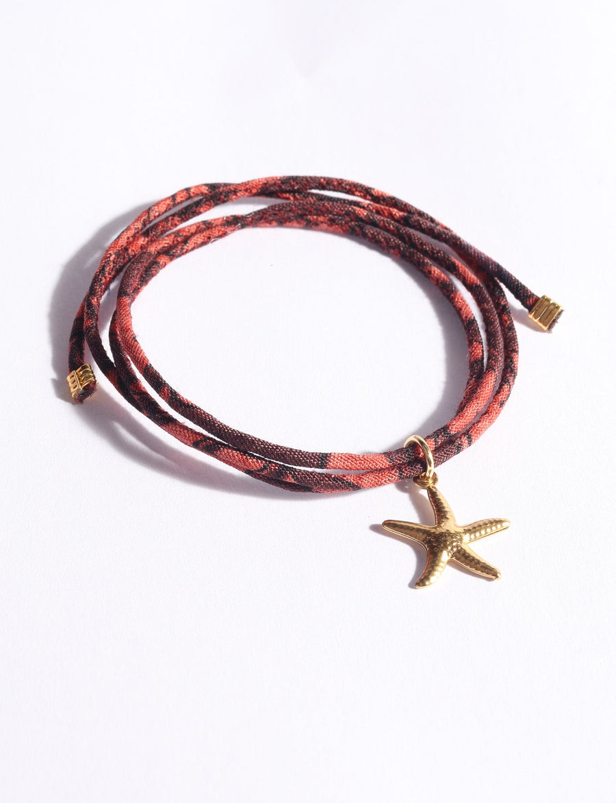 Bracciale con cordino e charm stella marina