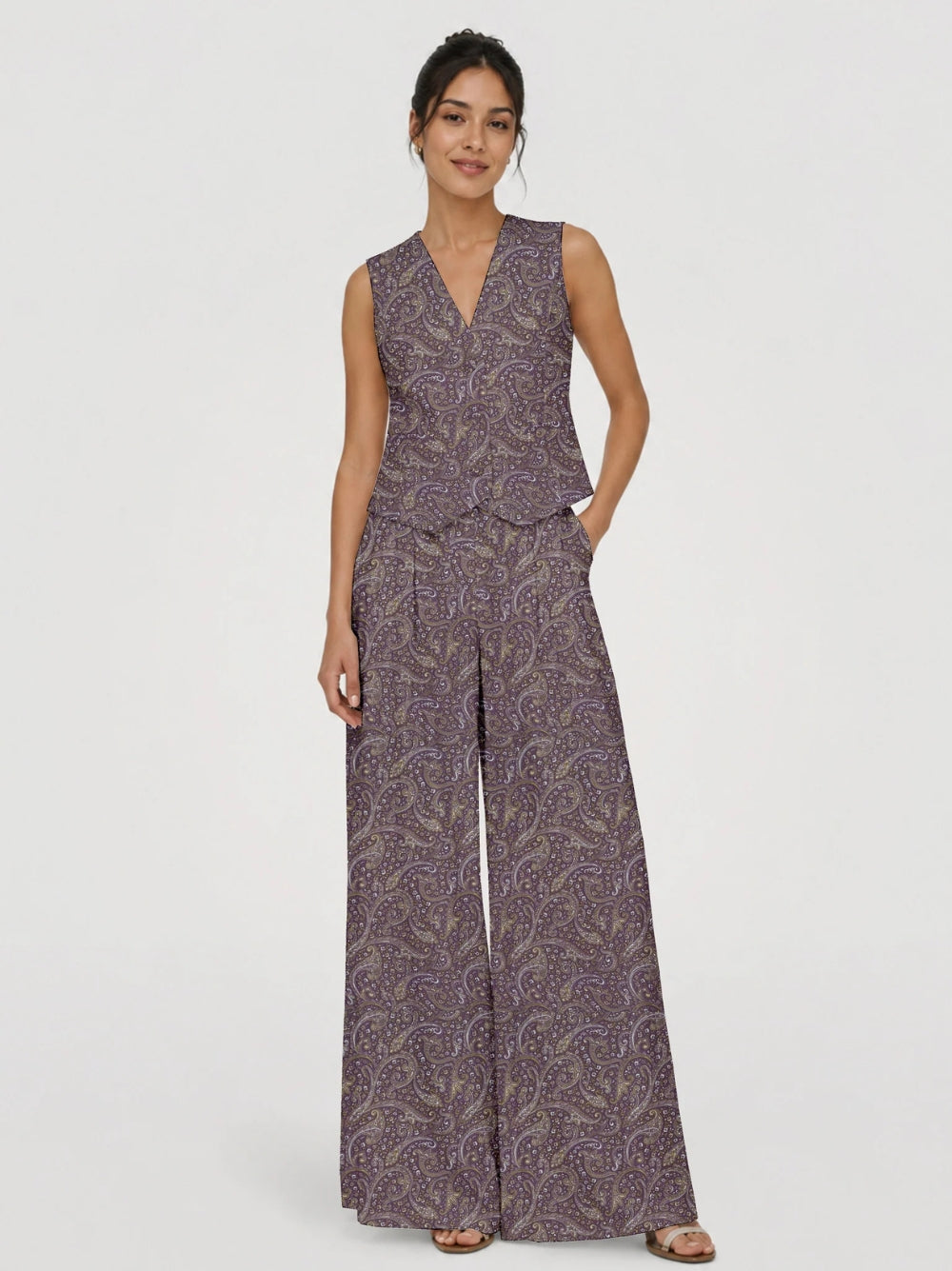 Women's tailored waistcoat set with a sleeveless V-neck button-front waistcoat and high-rise wide leg trousers in a coordinated matching outfit.