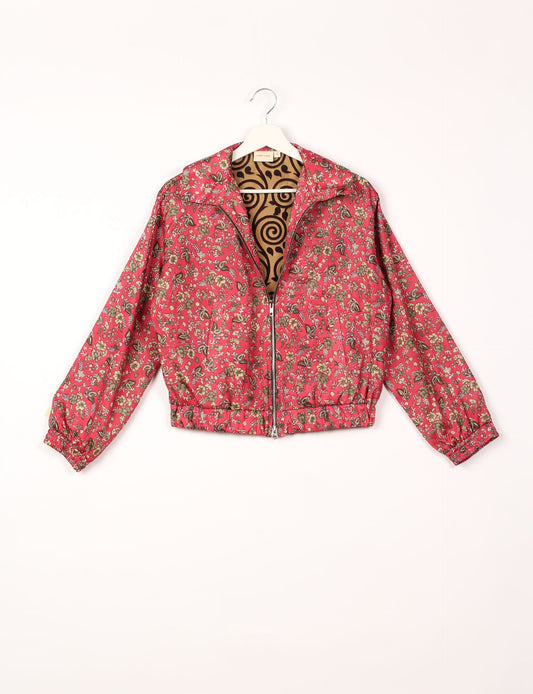 Stylish BOMBER JACKET, an upcycled clothing masterpiece with a cute cropped shape, elasticated details, and detachable metallic zipper. Contrast sari print lining adds a unique touch. Explore sustainable and eco-friendly fashion.