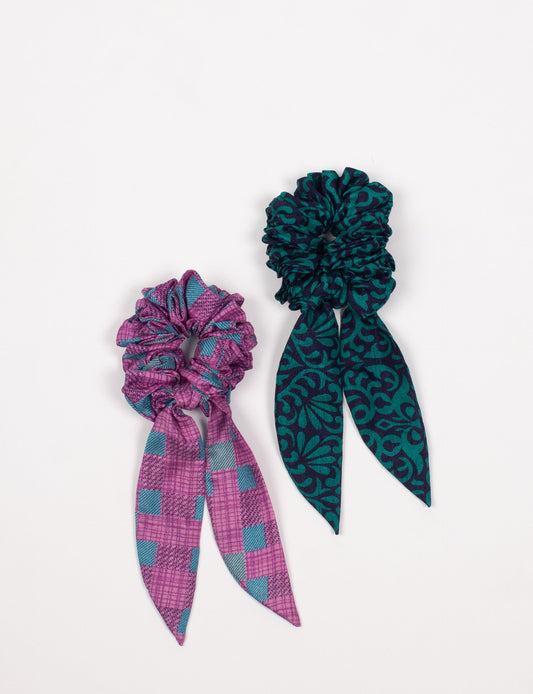 Colorful Tail Scrunchy made from sustainable, upcycled women's clothing. An eco-friendly fashion accessory promoting green fashion, recycled clothing, and ethical fashion choices.