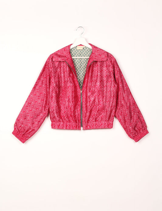 Stylish BOMBER JACKET, an upcycled clothing masterpiece with a cute cropped shape, elasticated details, and detachable metallic zipper. Contrast sari print lining adds a unique touch. Explore sustainable and eco-friendly fashion.