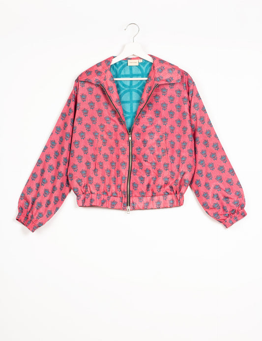 Stylish BOMBER JACKET, an upcycled clothing masterpiece with a cute cropped shape, elasticated details, and detachable metallic zipper. Contrast sari print lining adds a unique touch. Explore sustainable and eco-friendly fashion.