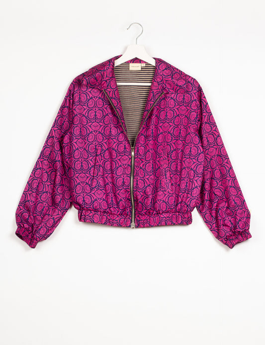 Stylish BOMBER JACKET, an upcycled clothing masterpiece with a cute cropped shape, elasticated details, and detachable metallic zipper. Contrast sari print lining adds a unique touch. Explore sustainable and eco-friendly fashion.