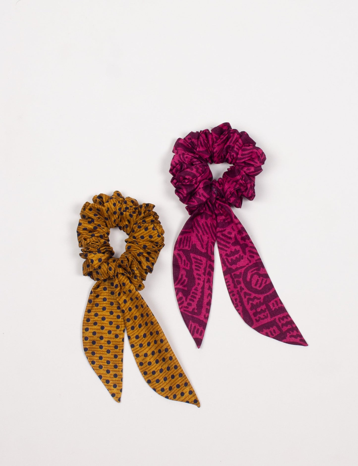 Colorful Tail Scrunchy made from sustainable, upcycled women's clothing. An eco-friendly fashion accessory promoting green fashion, recycled clothing, and ethical fashion choices.