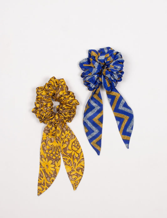 Colorful Tail Scrunchy made from sustainable, upcycled women's clothing. An eco-friendly fashion accessory promoting green fashion, recycled clothing, and ethical fashion choices.