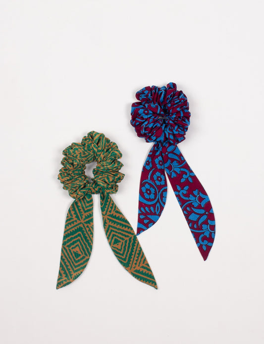 Colorful Tail Scrunchy made from sustainable, upcycled women's clothing. An eco-friendly fashion accessory promoting green fashion, recycled clothing, and ethical fashion choices.