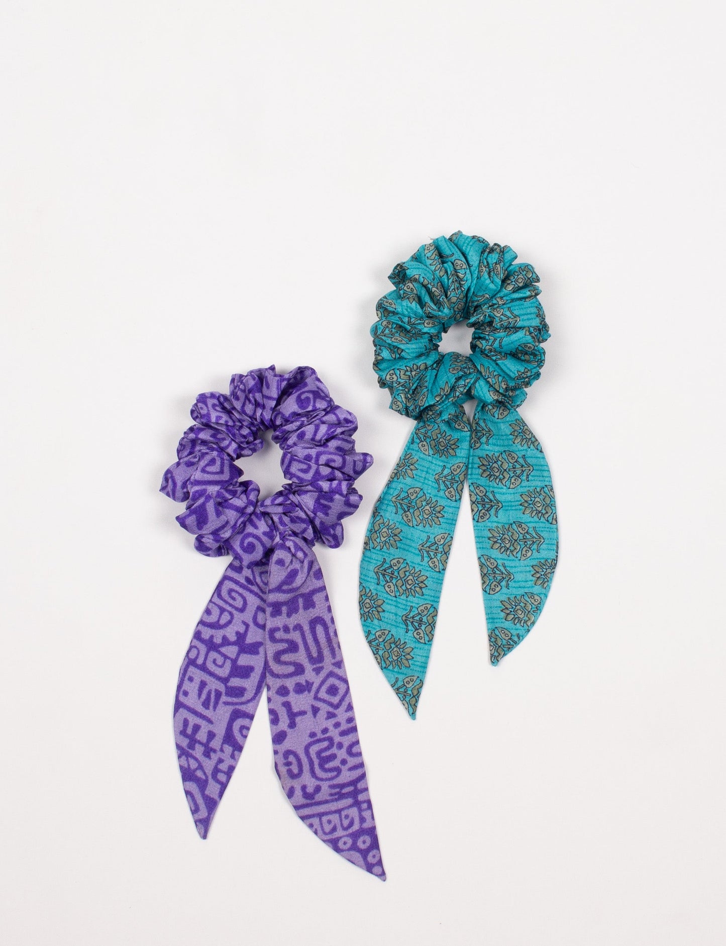 Colorful Tail Scrunchy made from sustainable, upcycled women's clothing. An eco-friendly fashion accessory promoting green fashion, recycled clothing, and ethical fashion choices.