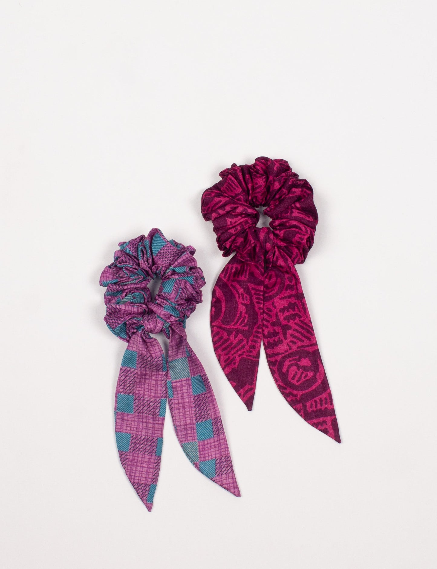 Colorful Tail Scrunchy made from sustainable, upcycled women's clothing. An eco-friendly fashion accessory promoting green fashion, recycled clothing, and ethical fashion choices.