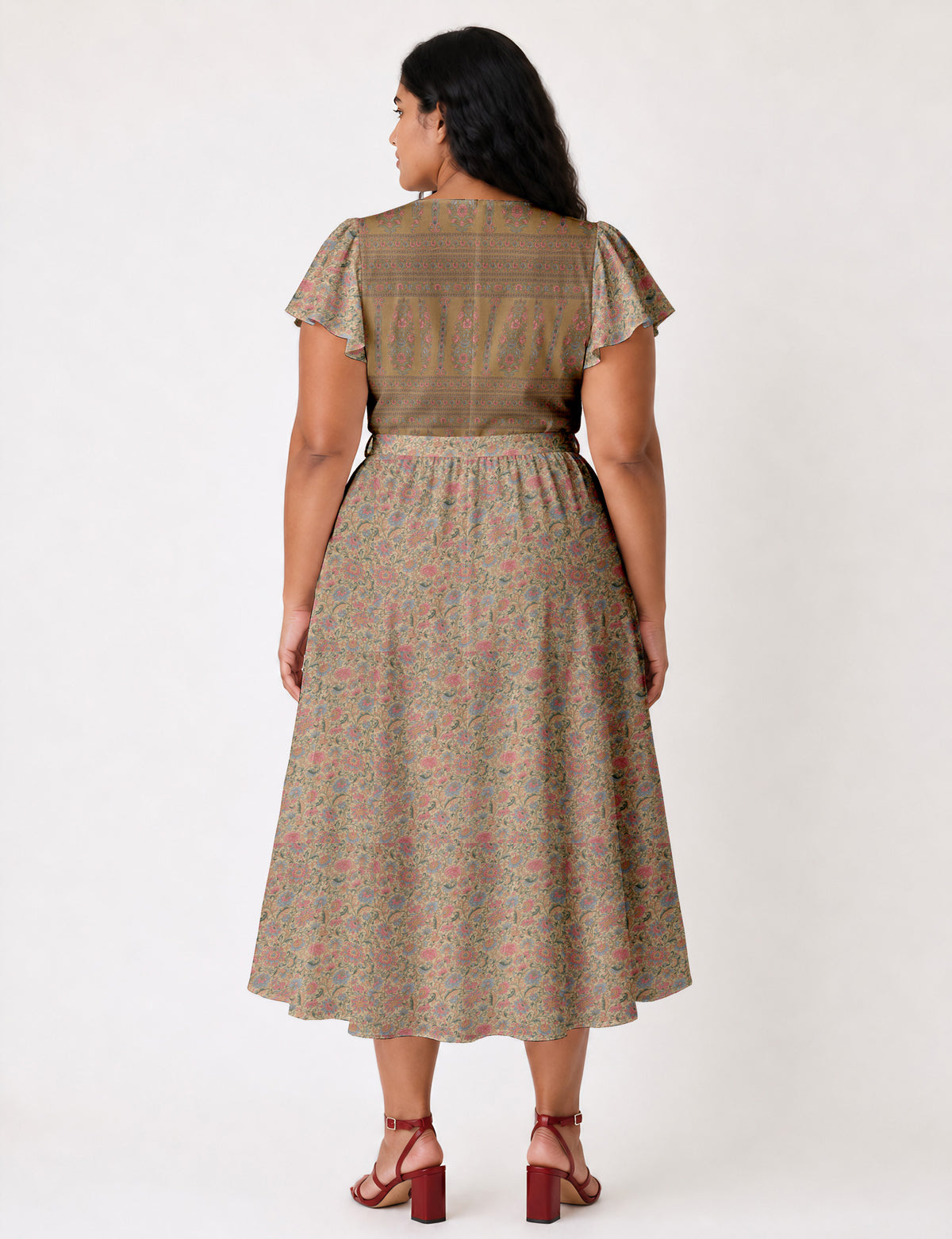 Elegant midi wrap dress with a V-neckline, adjustable waist tie, fitted bodice, and flared skirt for a timeless, flattering silhouette.
