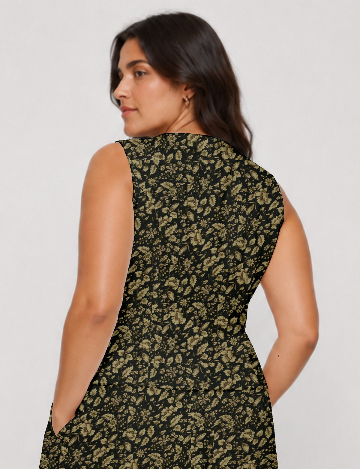 Women's fitted waistcoat with V-neck, single-breasted button closure, tailored silhouette, and pointed hem in sustainable fashion.