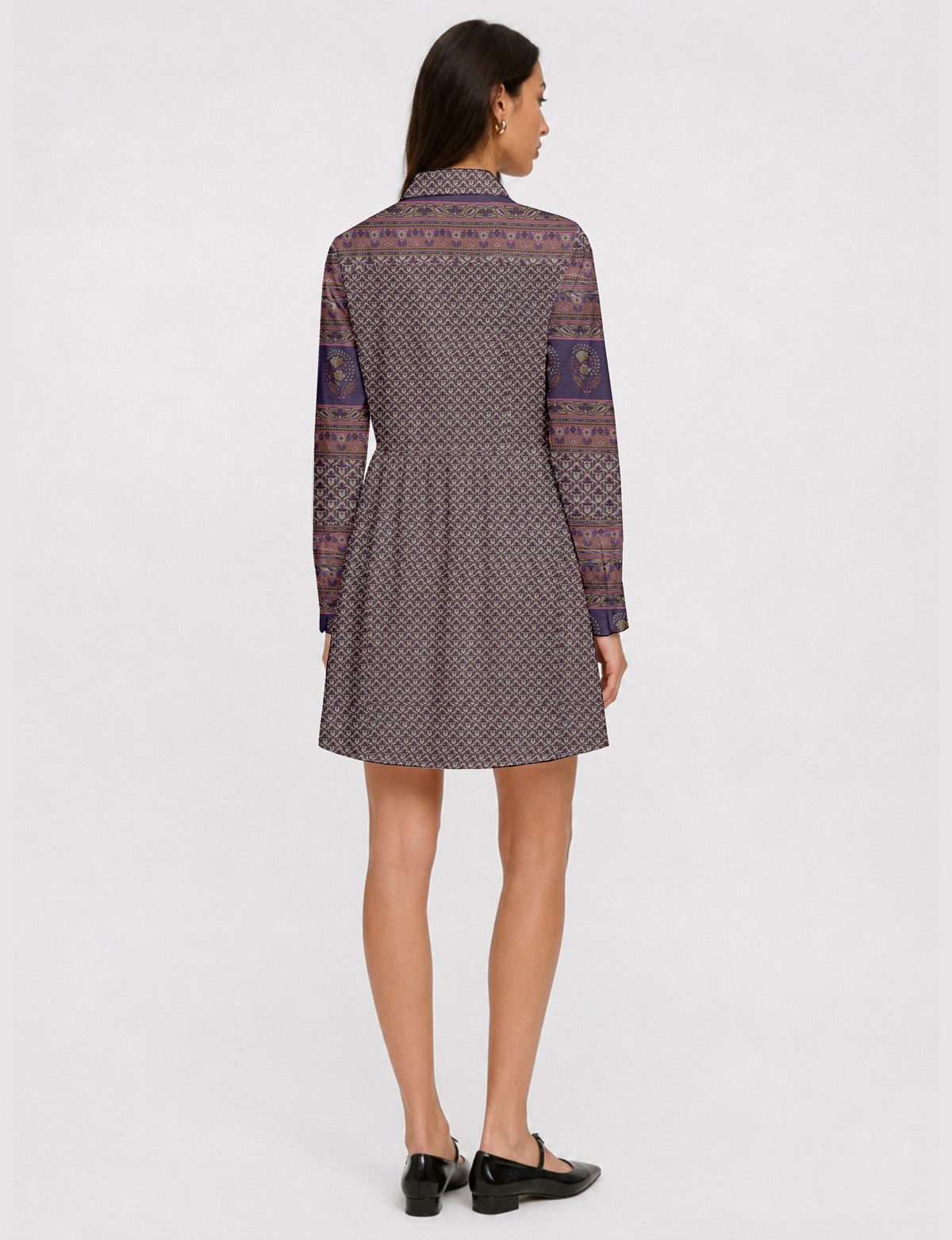 Short shirt dress with a relaxed A-line silhouette, point collar, partial button placket, gathered waist, side pockets, and full-length cuffed sleeves.
