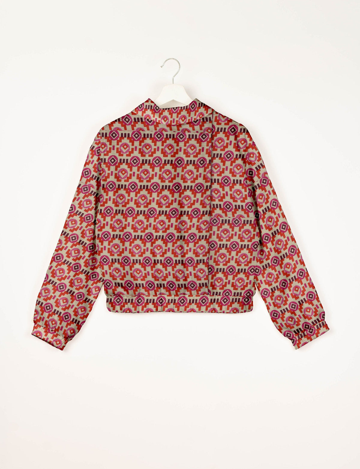 Love Bomber Jacket made from recycled fabric, featuring hand-stitched Aari embroidery. A unique piece of zero-waste clothing, part of the circular fashion movement. Designed with upcycled materials for a stylish yet environmentally friendly clothing choice.