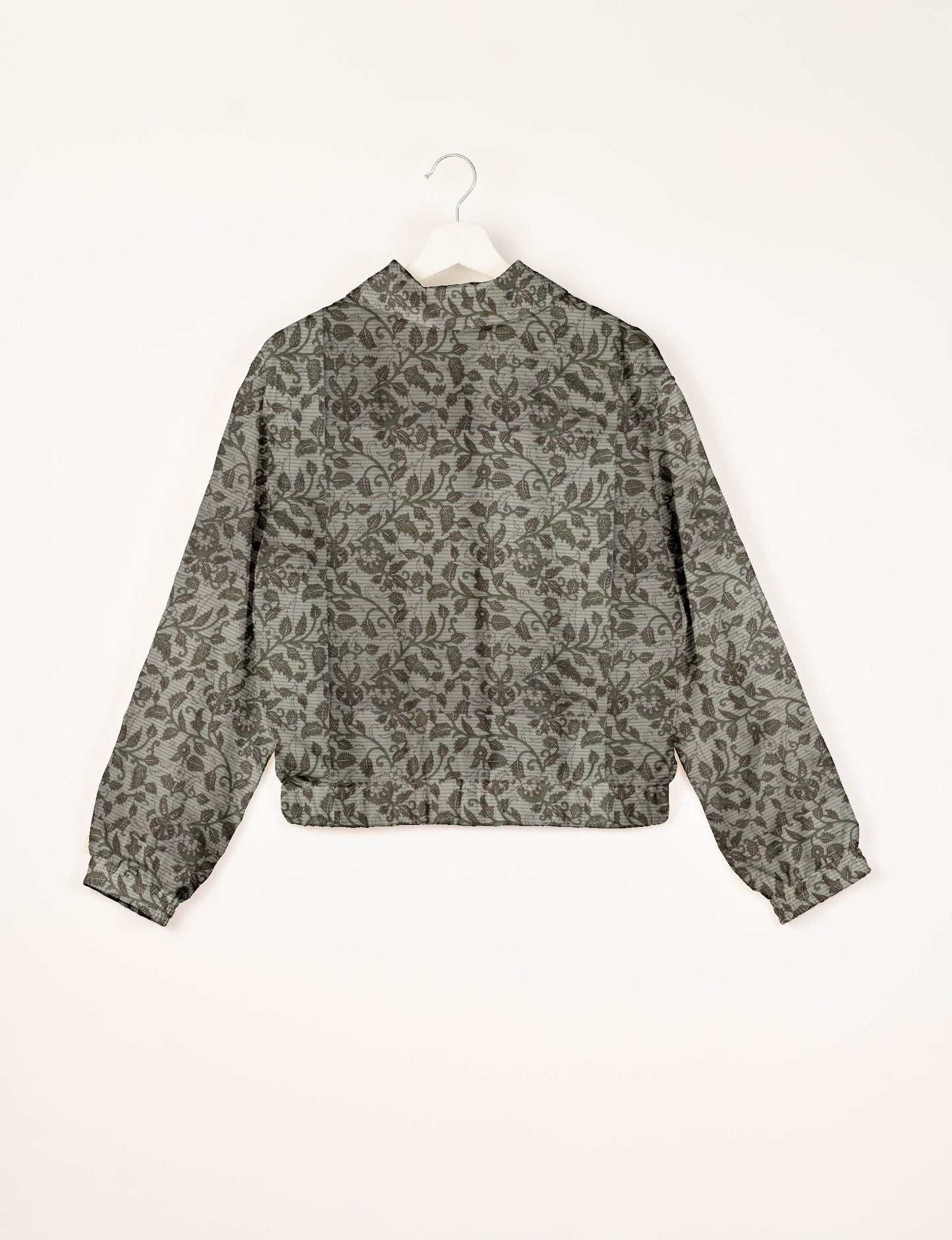 Upcycled Bomber Jacket made from recycled sari materials, featuring a cute cropped shape, elasticated hem and cuffs, and contrast sari print lining. Sustainable apparel promoting eco-friendly fashion and ethical clothing.