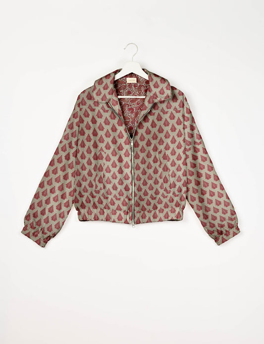 Upcycled Bomber Jacket made from recycled sari materials, featuring a cute cropped shape, elasticated hem and cuffs, and contrast sari print lining. Sustainable apparel promoting eco-friendly fashion and ethical clothing.