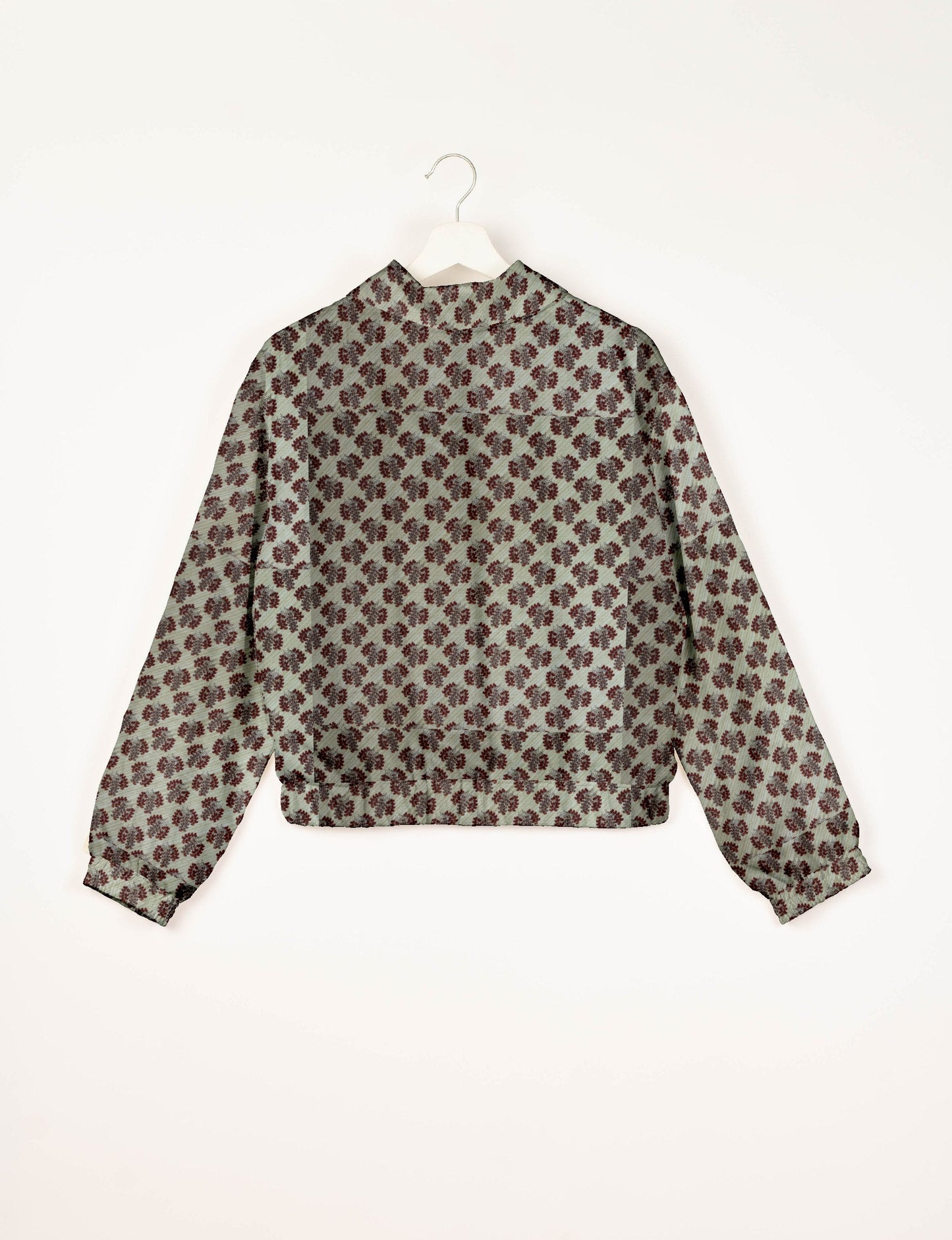 Upcycled Bomber Jacket made from recycled sari materials, featuring a cute cropped shape, elasticated hem and cuffs, and contrast sari print lining. Sustainable apparel promoting eco-friendly fashion and ethical clothing.