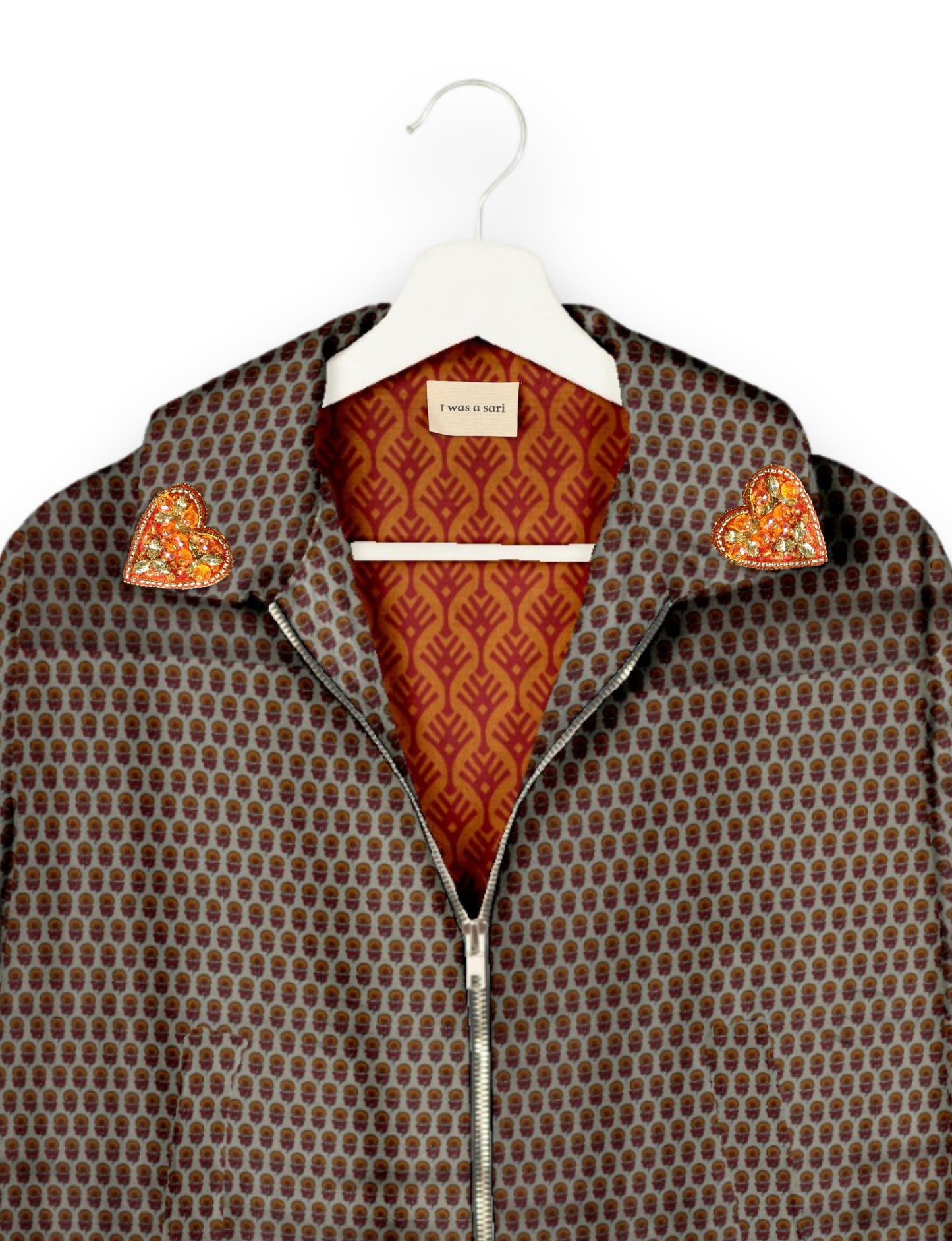 Make a bold statement with our Heart Drop Earrings, a symbol of conscious luxury and ethical fashion. Handcrafted using the intricate Aari embroidery technique, these earrings are made from upcycled sari fabric, embracing slow fashion and zero waste clothing. Elevate your look with sustainable apparel that supports fair trade fashion while reducing textile waste. Choose eco-friendly fashion that speaks of love, artistry, and responsibility.