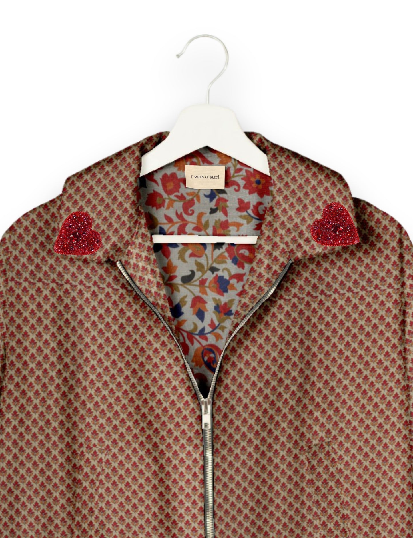 Make a bold statement with our Heart Drop Earrings, a symbol of conscious luxury and ethical fashion. Handcrafted using the intricate Aari embroidery technique, these earrings are made from upcycled sari fabric, embracing slow fashion and zero waste clothing. Elevate your look with sustainable apparel that supports fair trade fashion while reducing textile waste. Choose eco-friendly fashion that speaks of love, artistry, and responsibility.