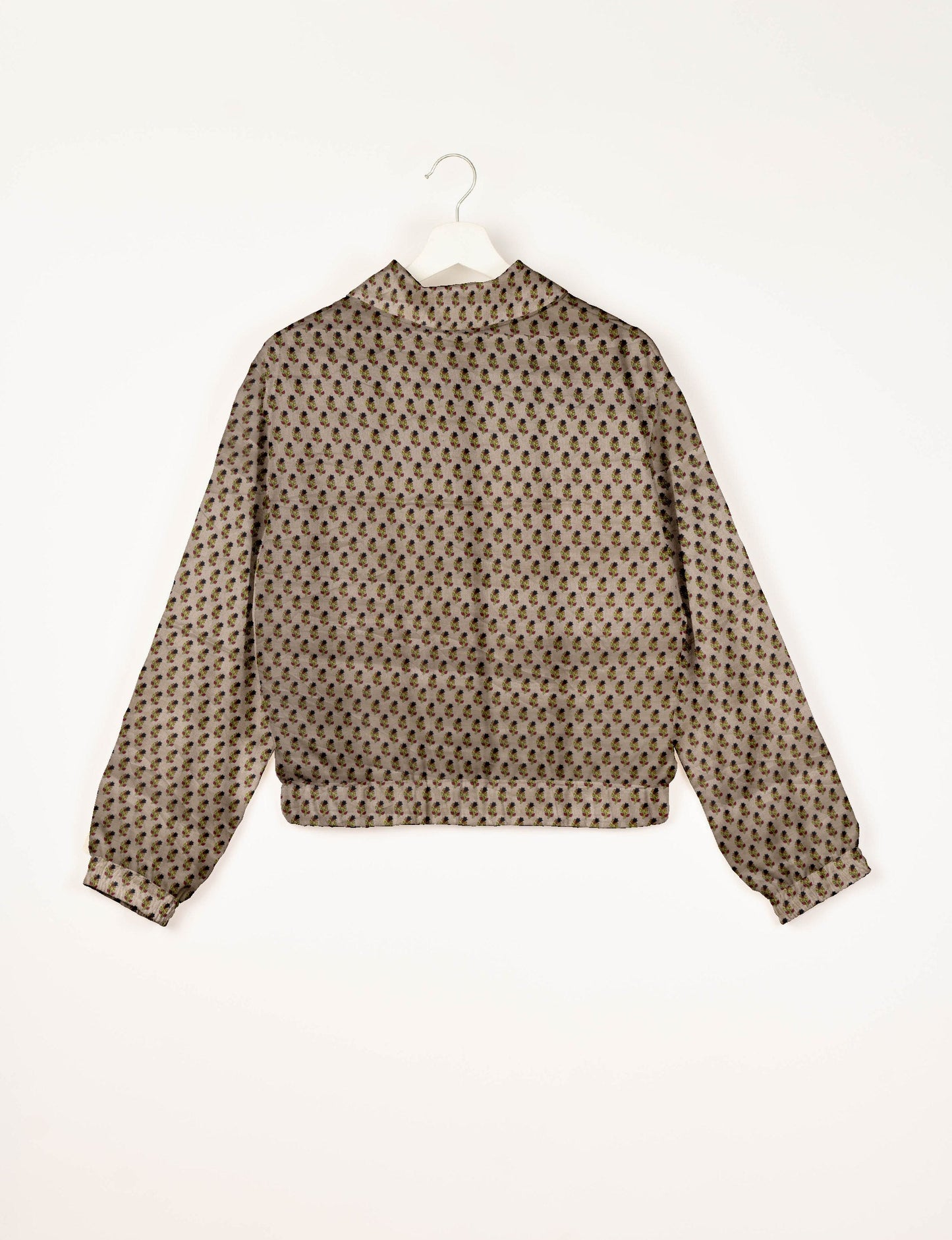 Love Bomber Jacket made from recycled fabric, featuring hand-stitched Aari embroidery. A unique piece of zero-waste clothing, part of the circular fashion movement. Designed with upcycled materials for a stylish yet environmentally friendly clothing choice.