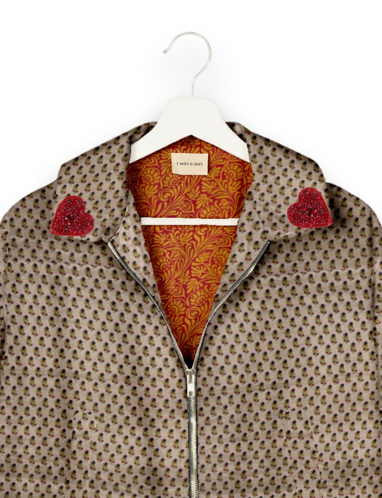 Make a bold statement with our Heart Drop Earrings, a symbol of conscious luxury and ethical fashion. Handcrafted using the intricate Aari embroidery technique, these earrings are made from upcycled sari fabric, embracing slow fashion and zero waste clothing. Elevate your look with sustainable apparel that supports fair trade fashion while reducing textile waste. Choose eco-friendly fashion that speaks of love, artistry, and responsibility.