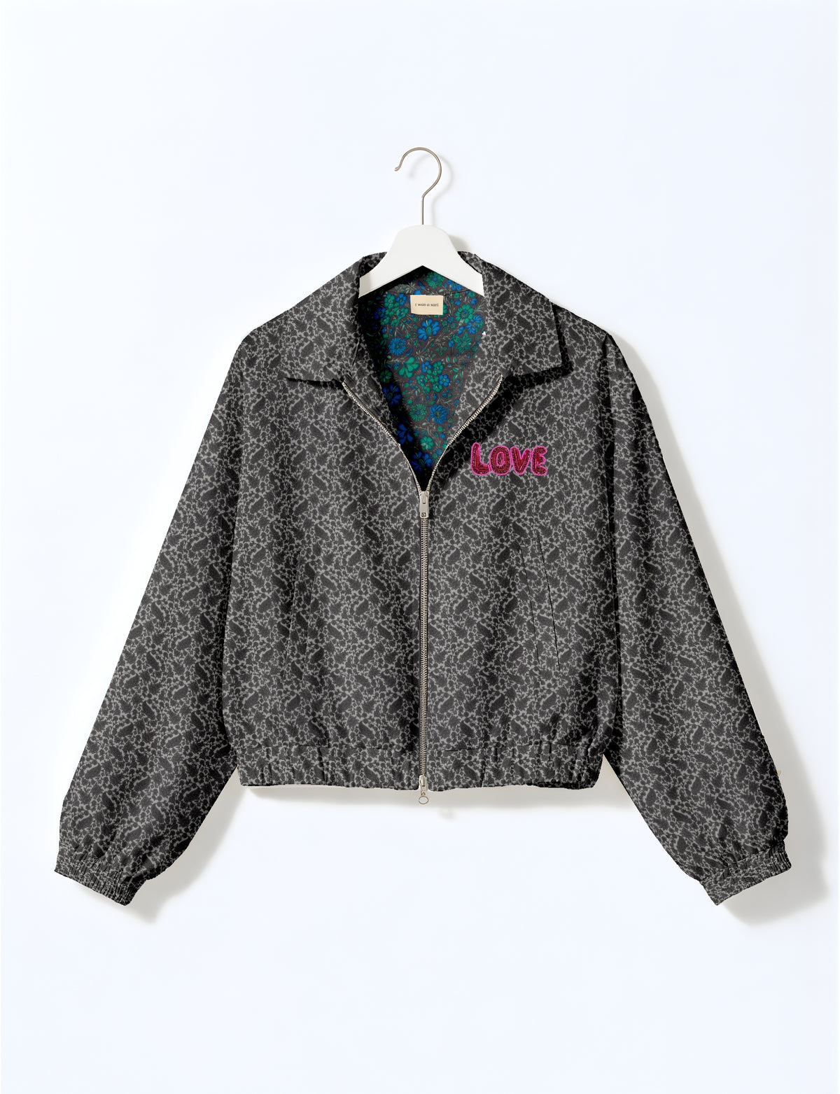 Love Bomber Jacket made from recycled fabric, featuring hand-stitched Aari embroidery. A unique piece of zero-waste clothing, part of the circular fashion movement. Designed with upcycled materials for a stylish yet environmentally friendly clothing choice.