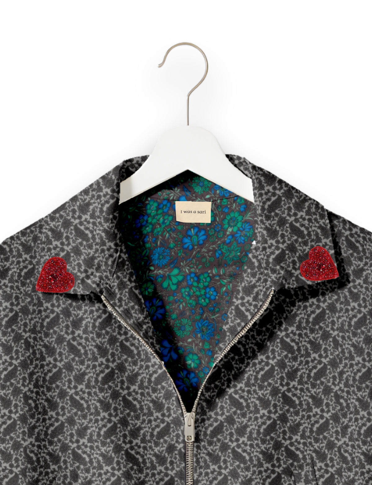 Love Bomber Jacket made from recycled fabric, featuring hand-stitched Aari embroidery. A unique piece of zero-waste clothing, part of the circular fashion movement. Designed with upcycled materials for a stylish yet environmentally friendly clothing choice.