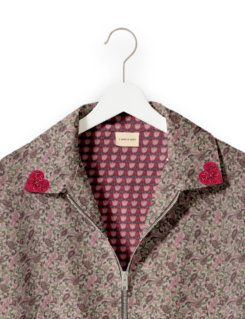 Love Bomber Jacket made from recycled fabric, featuring hand-stitched Aari embroidery. A unique piece of zero-waste clothing, part of the circular fashion movement. Designed with upcycled materials for a stylish yet environmentally friendly clothing choice.
