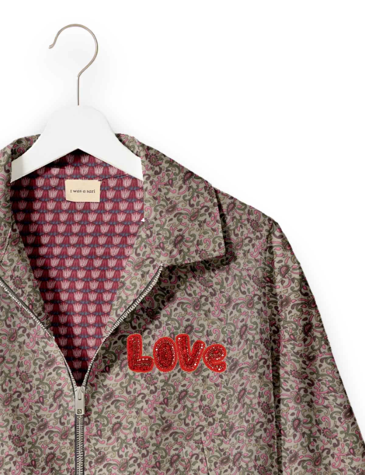 Love Bomber Jacket made from recycled fabric, featuring hand-stitched Aari embroidery. A unique piece of zero-waste clothing, part of the circular fashion movement. Designed with upcycled materials for a stylish yet environmentally friendly clothing choice.