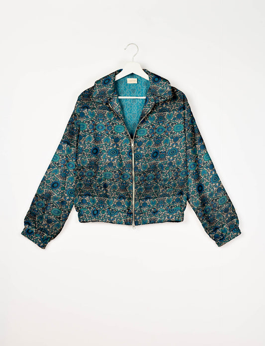 Upcycled Bomber Jacket made from recycled sari materials, featuring a cute cropped shape, elasticated hem and cuffs, and contrast sari print lining. Sustainable apparel promoting eco-friendly fashion and ethical clothing.