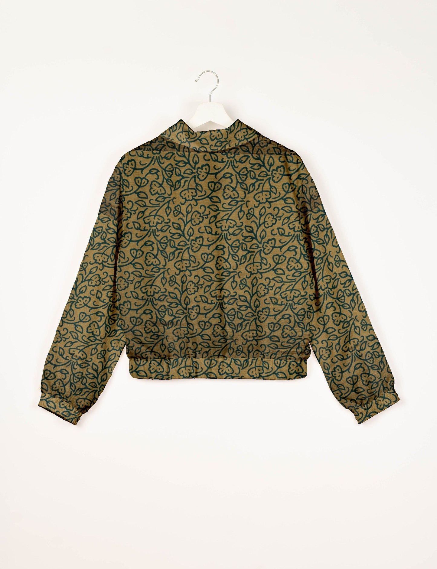 Upcycled Bomber Jacket made from recycled sari materials, featuring a cute cropped shape, elasticated hem and cuffs, and contrast sari print lining. Sustainable apparel promoting eco-friendly fashion and ethical clothing.