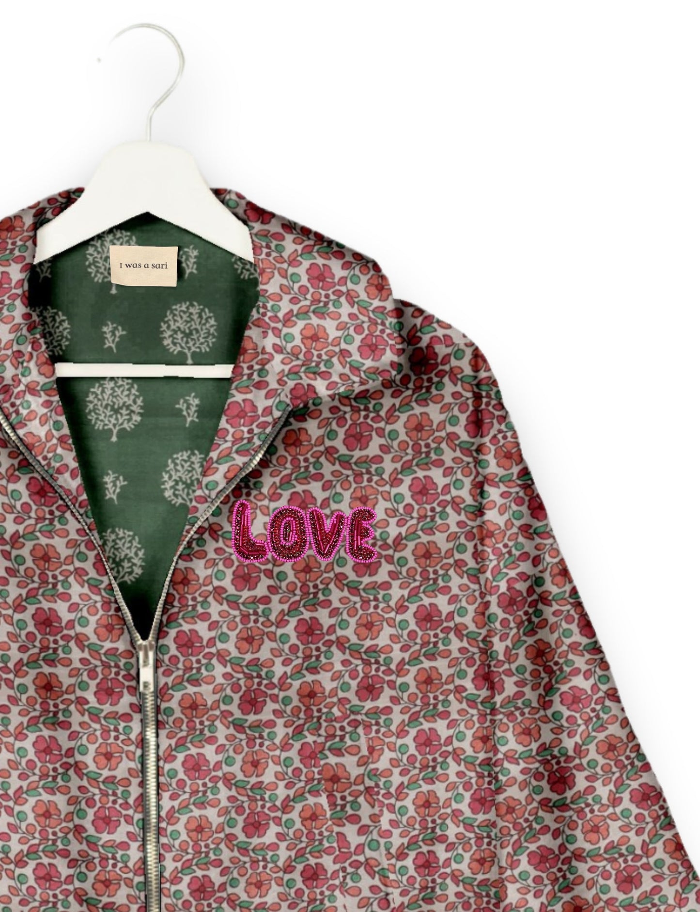 Love Bomber Jacket made from recycled fabric, featuring hand-stitched Aari embroidery. A unique piece of zero-waste clothing, part of the circular fashion movement. Designed with upcycled materials for a stylish yet environmentally friendly clothing choice.