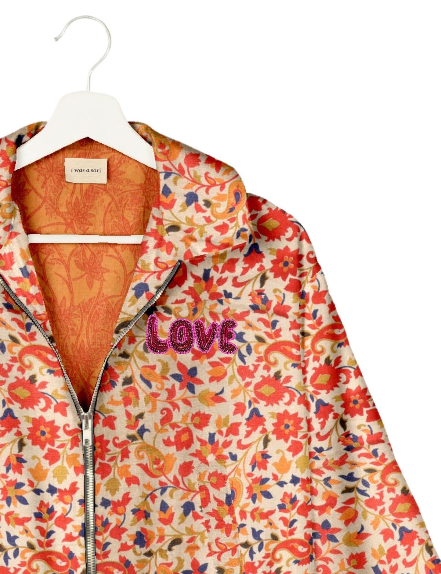 Love Bomber Jacket made from recycled fabric, featuring hand-stitched Aari embroidery. A unique piece of zero-waste clothing, part of the circular fashion movement. Designed with upcycled materials for a stylish yet environmentally friendly clothing choice.