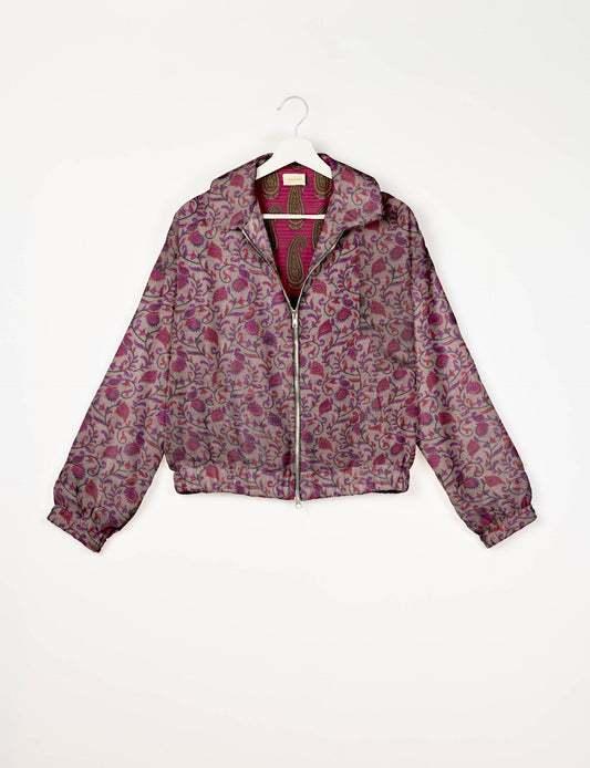 Upcycled Bomber Jacket made from recycled sari materials, featuring a cute cropped shape, elasticated hem and cuffs, and contrast sari print lining. Sustainable apparel promoting eco-friendly fashion and ethical clothing.