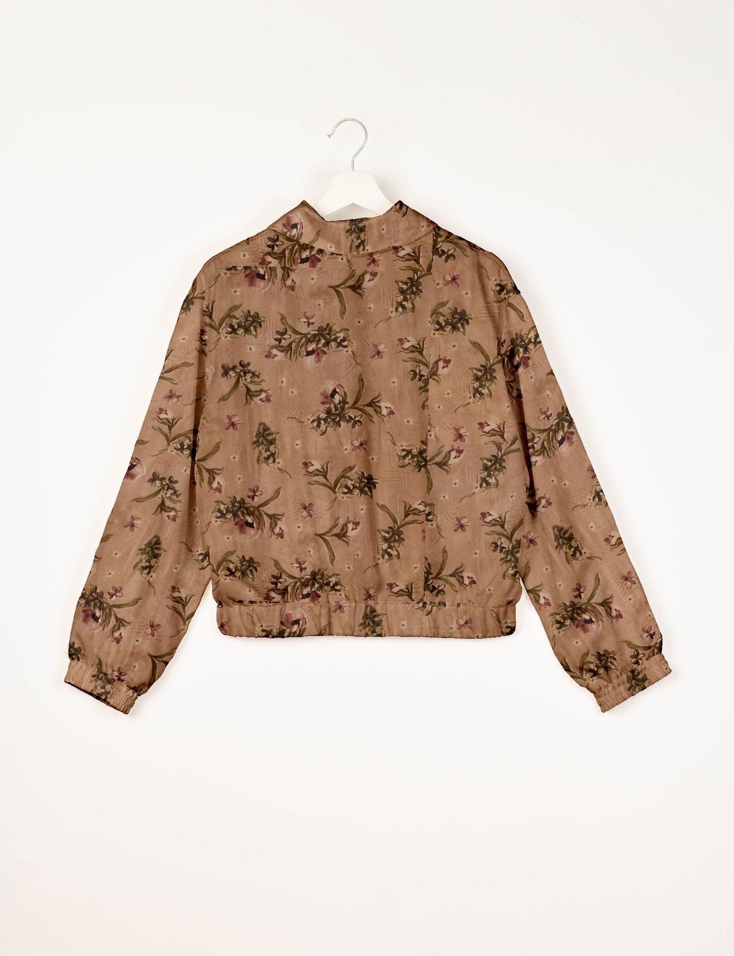 Stylish BOMBER JACKET, an upcycled clothing masterpiece with a cute cropped shape, elasticated details, and detachable metallic zipper. Contrast sari print lining adds a unique touch. Explore sustainable and eco-friendly fashion.