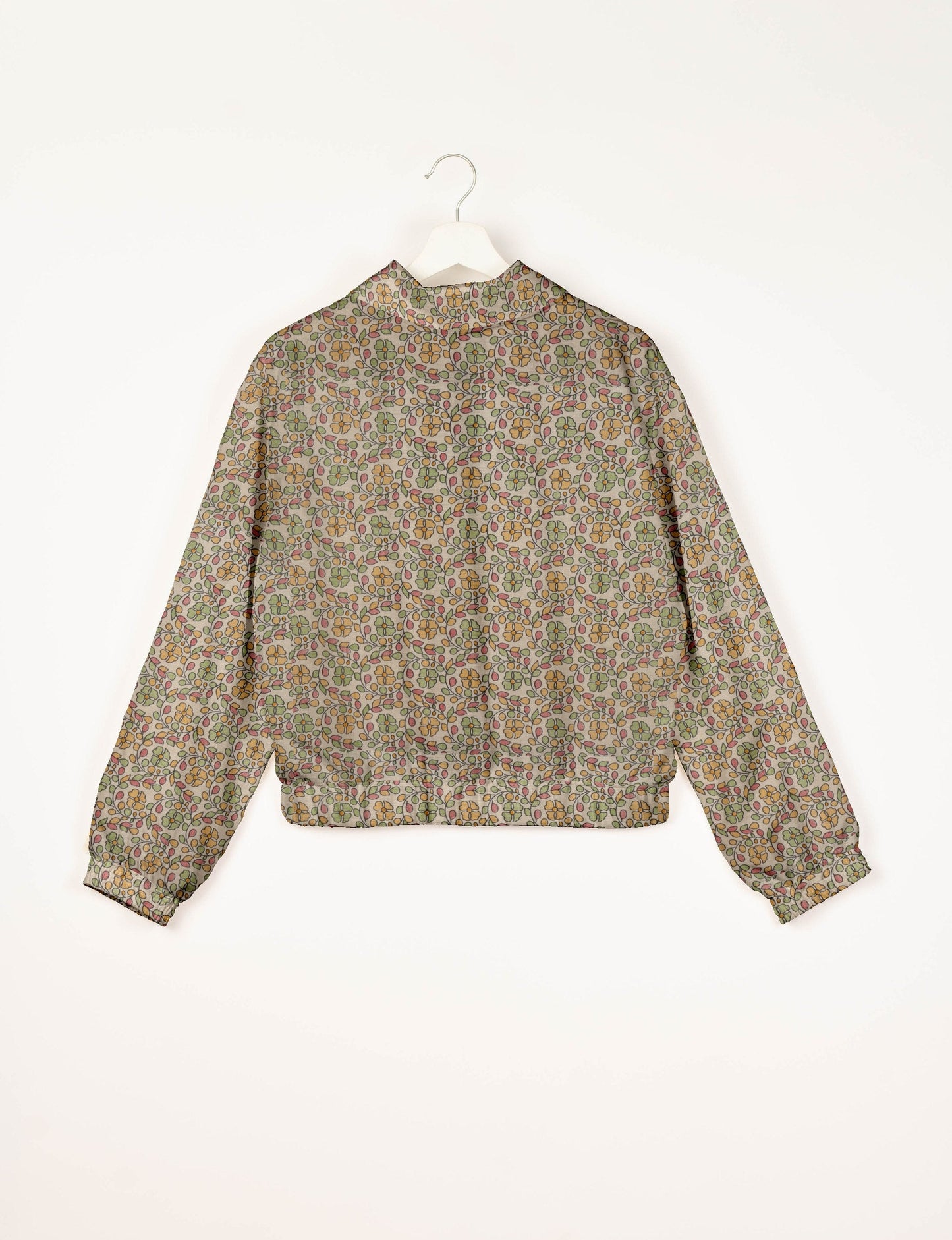 Upcycled Bomber Jacket made from recycled sari materials, featuring a cute cropped shape, elasticated hem and cuffs, and contrast sari print lining. Sustainable apparel promoting eco-friendly fashion and ethical clothing.