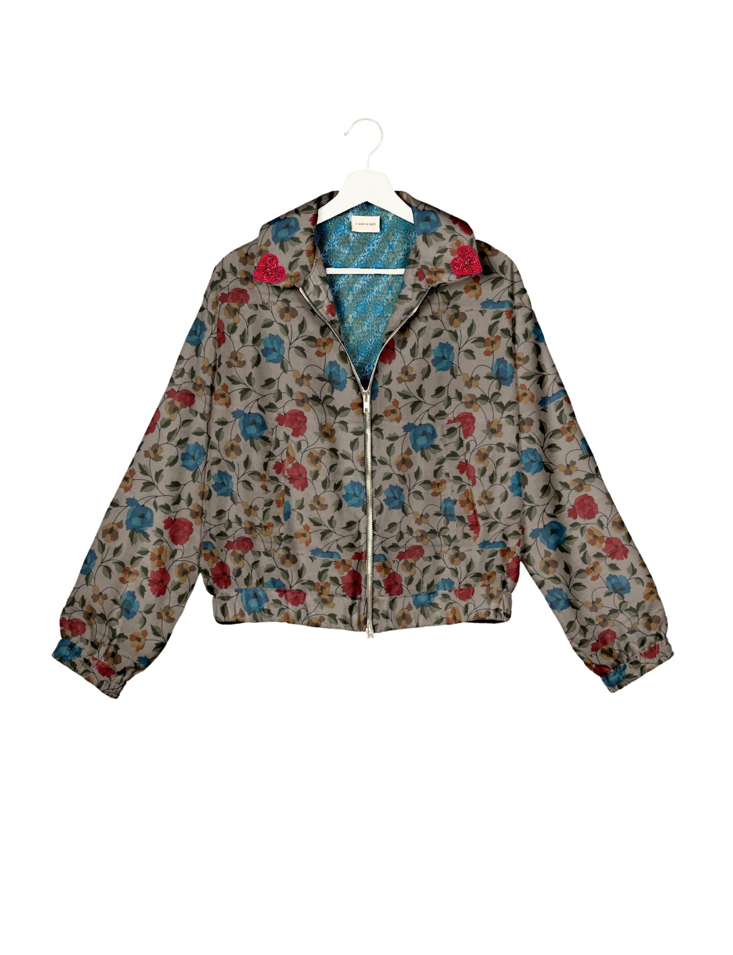 Make a bold statement with our Heart Drop Earrings, a symbol of conscious luxury and ethical fashion. Handcrafted using the intricate Aari embroidery technique, these earrings are made from upcycled sari fabric, embracing slow fashion and zero waste clothing. Elevate your look with sustainable apparel that supports fair trade fashion while reducing textile waste. Choose eco-friendly fashion that speaks of love, artistry, and responsibility.