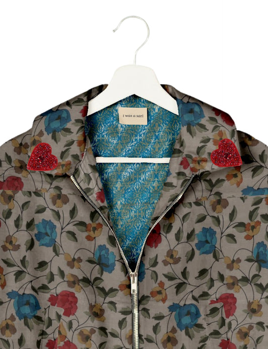 Make a bold statement with our Heart Drop Earrings, a symbol of conscious luxury and ethical fashion. Handcrafted using the intricate Aari embroidery technique, these earrings are made from upcycled sari fabric, embracing slow fashion and zero waste clothing. Elevate your look with sustainable apparel that supports fair trade fashion while reducing textile waste. Choose eco-friendly fashion that speaks of love, artistry, and responsibility.