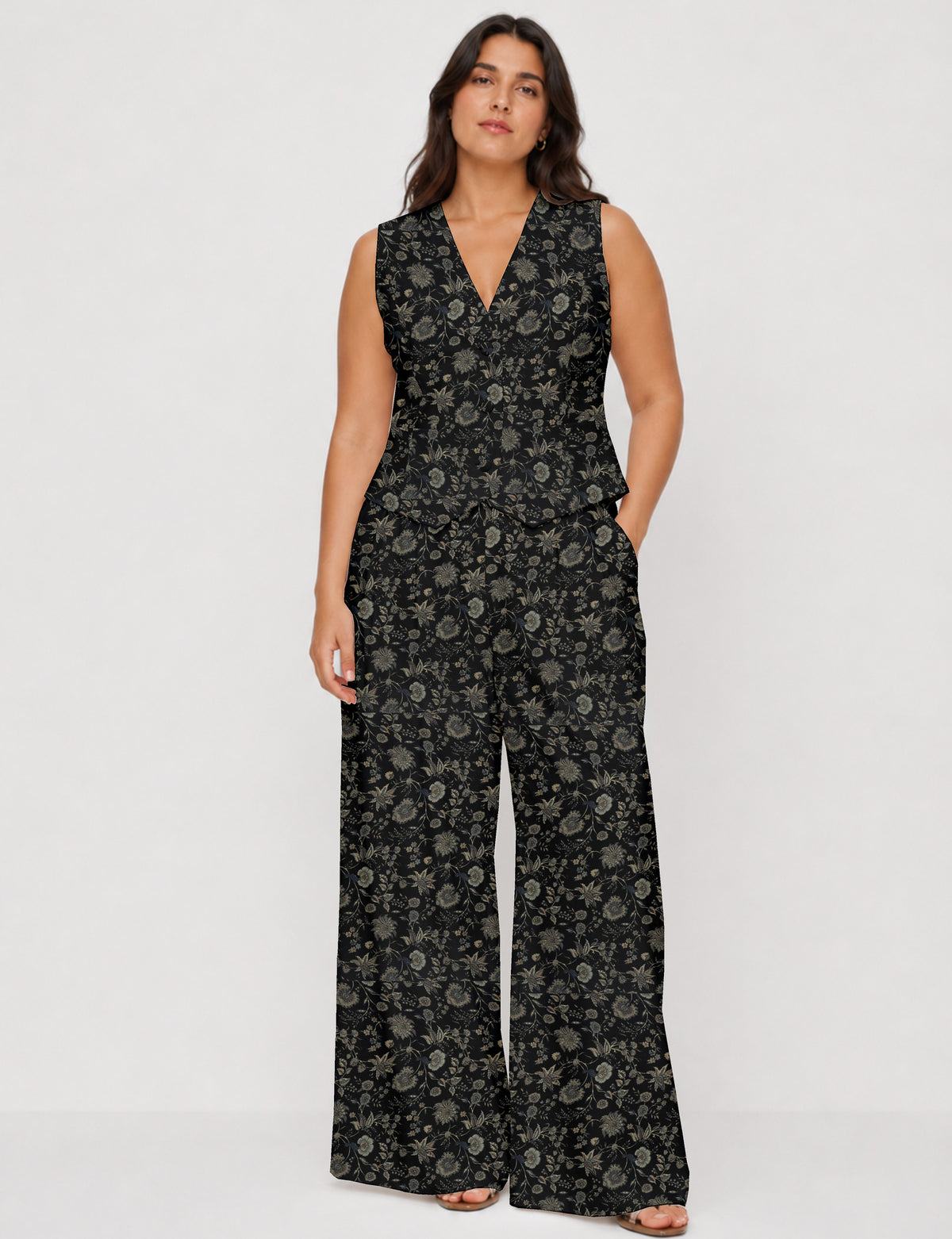 Women's tailored waistcoat set with a sleeveless V-neck button-front waistcoat and high-rise wide leg trousers in a coordinated matching outfit.