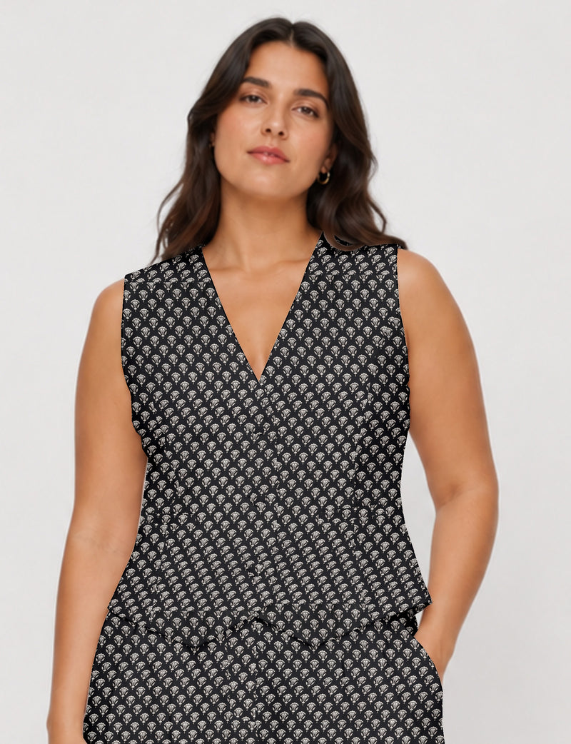 Women's fitted waistcoat with V-neck, single-breasted button closure, tailored silhouette, and pointed hem in sustainable fashion.