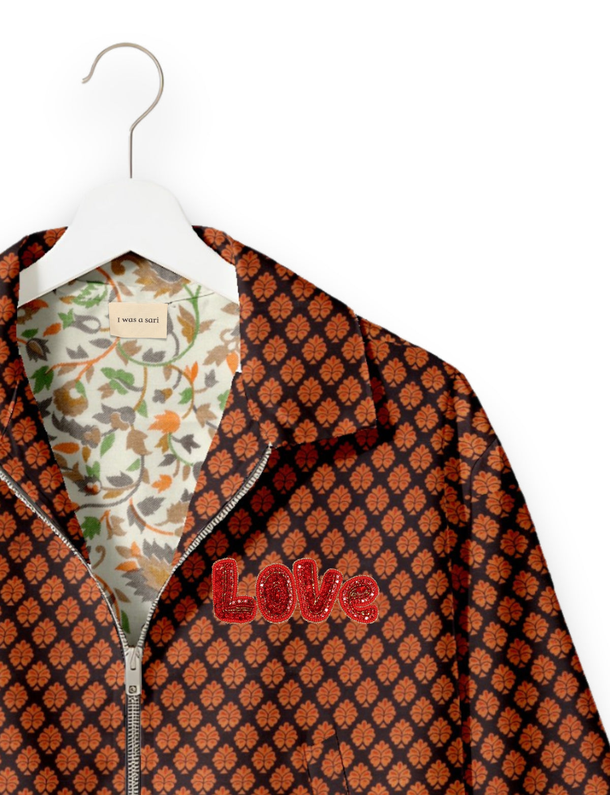 Love Bomber Jacket made from recycled fabric, featuring hand-stitched Aari embroidery. A unique piece of zero-waste clothing, part of the circular fashion movement. Designed with upcycled materials for a stylish yet environmentally friendly clothing choice.